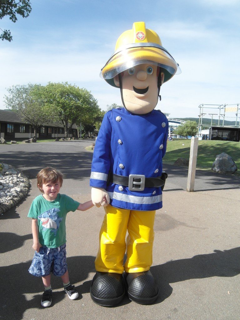 Fireman Sam and a boy.