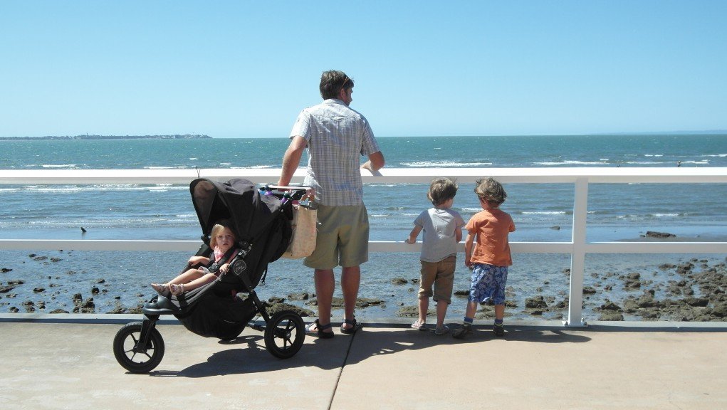 A family looking out to sea