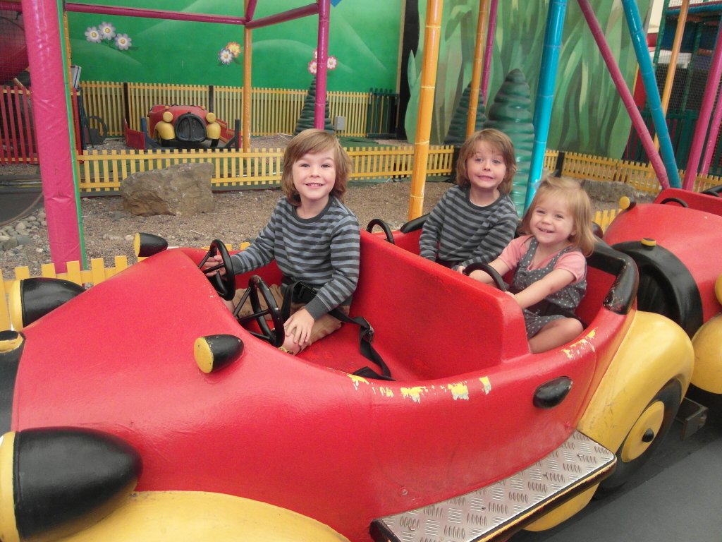 Three kids on a ride