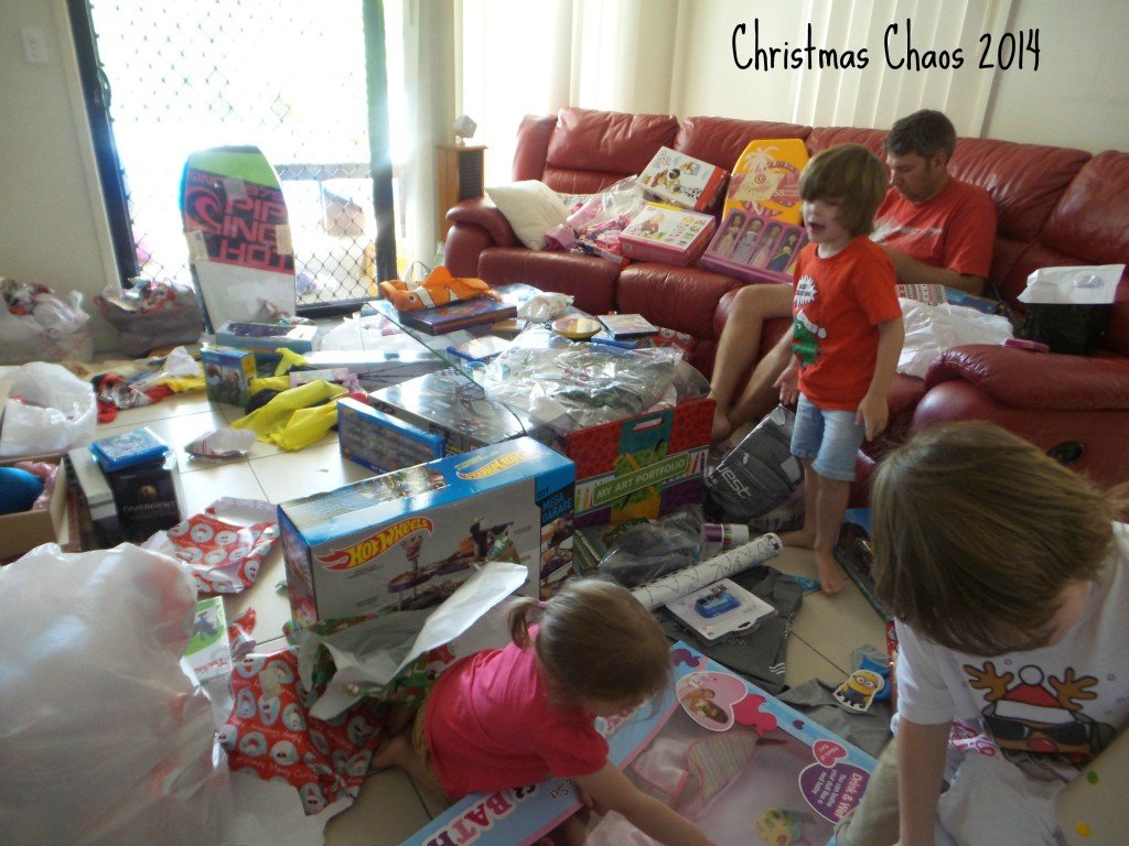 Children opening presents on Christmas Day