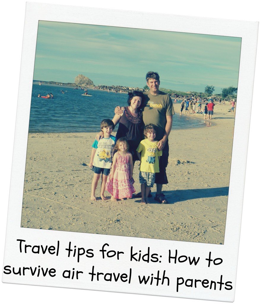 A family on a beach - travel tips for kids